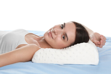 Obraz premium Woman lying on bed with orthopedic pillow against transparent background