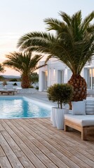 Fototapeta premium A spacious resort boasts palm trees next to a clear pool, creating an inviting scene for guests to unwind during sunset