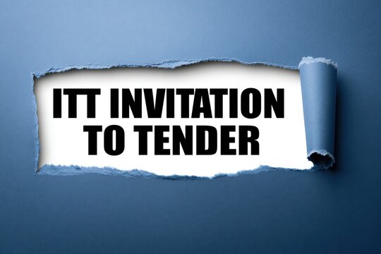 itt invitation to tender text revealed under torn dark blue paper