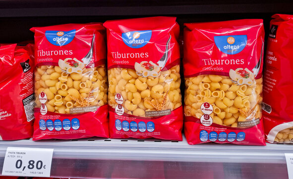 DENIA, SPAIN - January 31, 2026.Packs of Alteza Tiburones pasta arranged on a grocery store shelf in Spain during a shopping visit