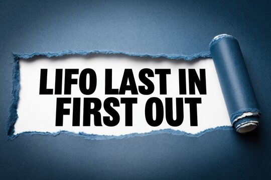 LIFO last in first out text under torn dark blue paper