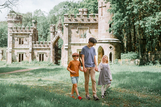 Family Exploring Historic Ballysaggartmore Towers in County Waterford, Ireland