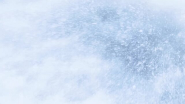 Blizzard storm sweeping through snowy landscape in intense winter scene