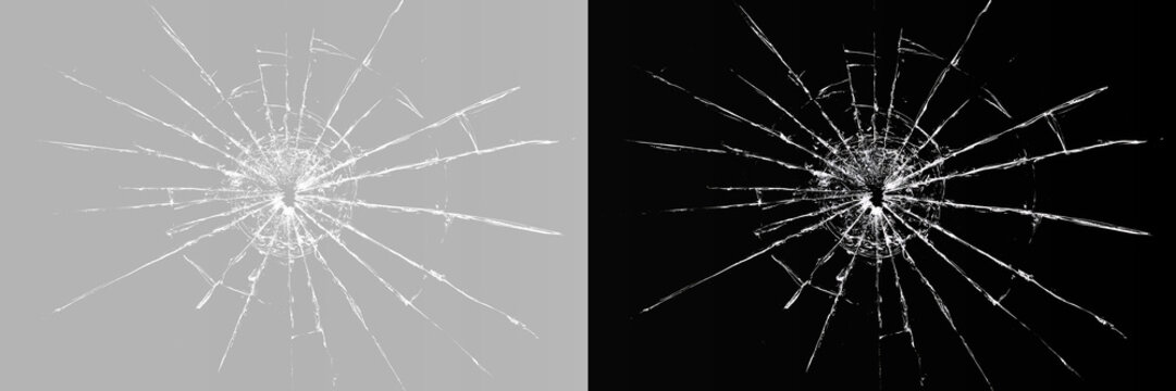 Broken glass texture with bullet hole and radial cracks on transparent and black background
