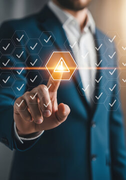 Professional identifying a critical warning in digital interface