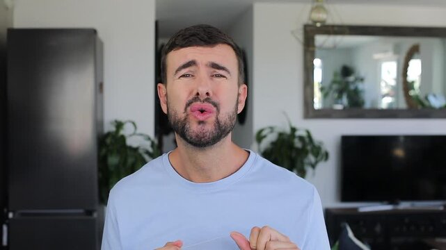 Man Flossing Who is Flossing His Teeth Smelling Something Rotten 