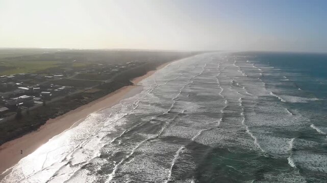 Aerial view of beach and waves in Coorong National Park, Australia. Slow motion