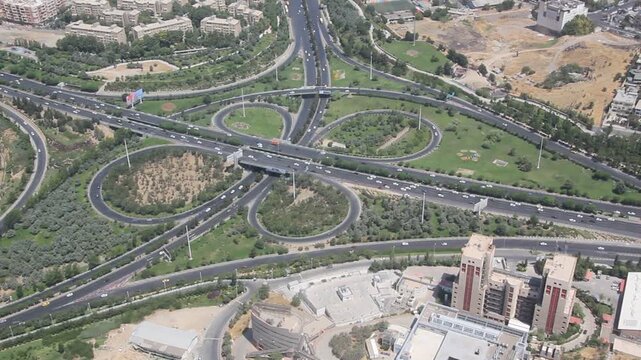 Aerial view of Hemmat and Sheikh Fazlollah Nuri Expressways crossing in Tehran, capital of Iran.