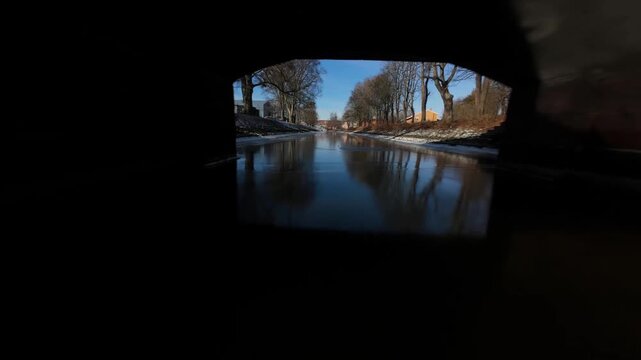Aerial View of Frozen River Canal and Bridge on Cold inter Day