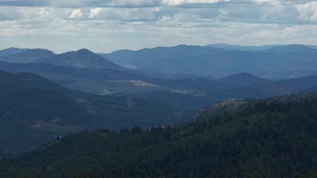Aerial view of Idaho Coeur Dalene National Forest and vast mountain landscape from Osburn Idaho