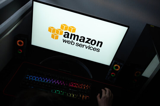 Punta Arenas, Chile &ndash; June 12, 2026: The official Amazon Web Services (AWS) logo displayed on a computer screen in a dark workspace setup with an RGB backlit keyboard