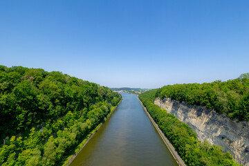 Fototapeta premium The Albert Canal in Lanaye and Kanne villages in Province de Liège, Walloon Region, Belgium, Border between Maastricht, Limburg, Netherlands, Canal connects also the Meuse river with the Scheldt river