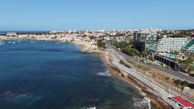 Aerial drone view of Avenida Marginal coastal highway and seaside resorts in Cascais Portugal
