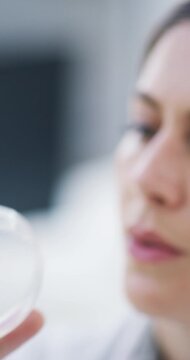 Woman, scientist or petri dish with plant in lab for exam, forensic research or medical study. Female person, biologist or botanist with computer screen, leaf sample or microscope for science test