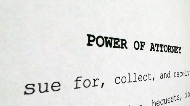 Power of Attorney Document Close-Up With Typed Legal Text and Financial Authorization
