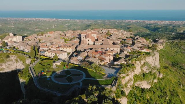 Gerace hamlet aerial view at sunset time near the Calabria sea