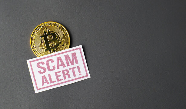 Bitcoin Scam Alert Concept on Dark Background
