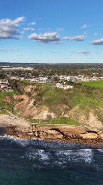 O'Sullivan Beach and Christies Beach, Adelaide, South Australia &ndash; 4K vertical aerial drone footage of sandy coastline, coastal suburbs, waterfront house, beaches, cliffs, marina, boat ramp
