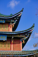 Obraz premium Traditional Chinese Temple Roofs with Ornate Eaves, Kunming