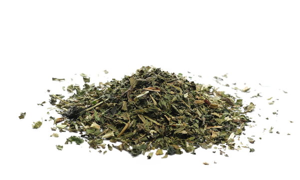 Dry, cut and sliced nettle pile, isolated on white background