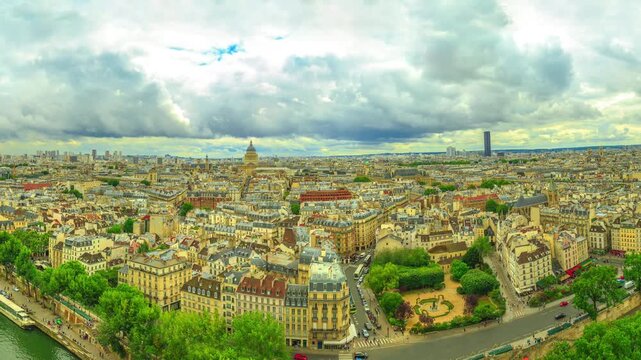 360 degrees skyline aerial view of Paris in France with the Tour Eiffel tower and Pont Saint-Michel bridge on Senna river, from top of the church Notre Dame of Paris, France.
