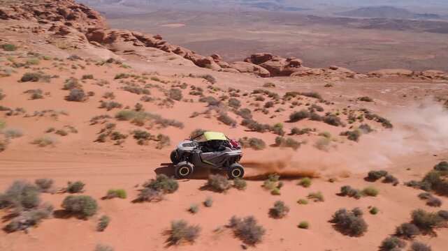Aerial Drone View of UTVs Speeding Along Open Desert Trails in Utah