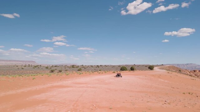 Aerial Drone View of UTVs Speeding Along Open Desert Trails in Utah