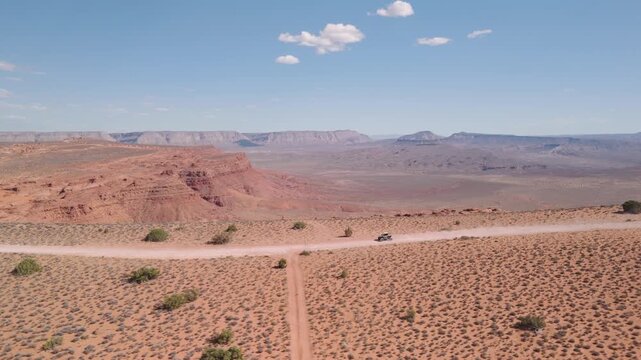 Aerial Drone View of UTVs Speeding Along Open Desert Trails in Utah