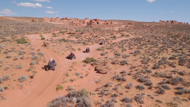 Aerial Drone View of UTVs Speeding Along Open Desert Trails in Utah