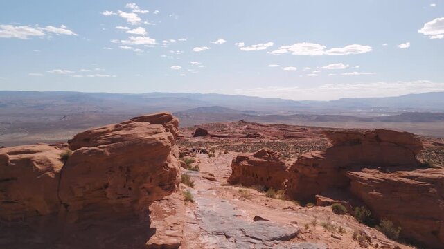 Aerial Drone View of UTVs Offroading on Red Rock Desert Trails in Utah