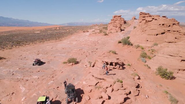 Aerial Drone View of UTVs Speeding Along Open Desert Trails in Utah