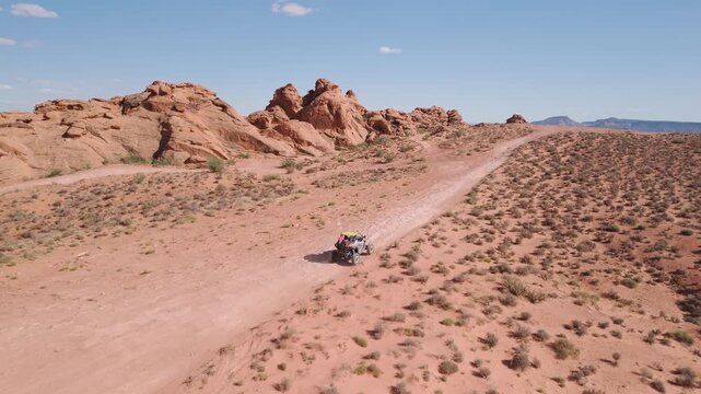 Aerial Drone View of UTVs Speeding Along Open Desert Trails in Utah
