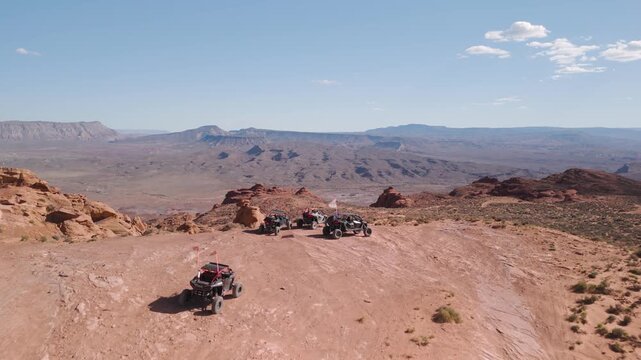 Aerial Drone View of UTVs Speeding Along Open Desert Trails in Utah