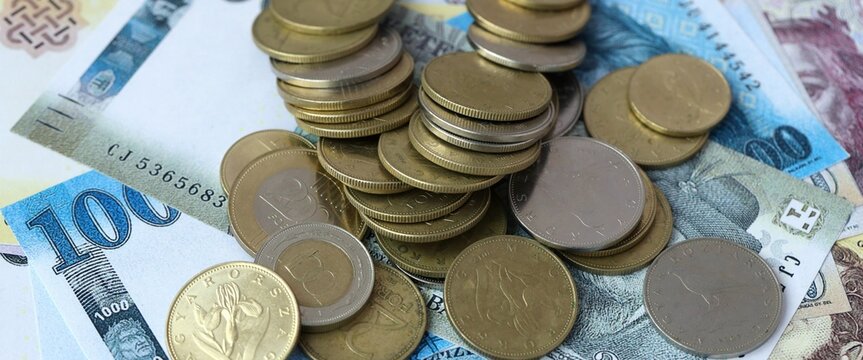 Hungarian forint money bills and coins on table. Hungary cash of HUF currency close up