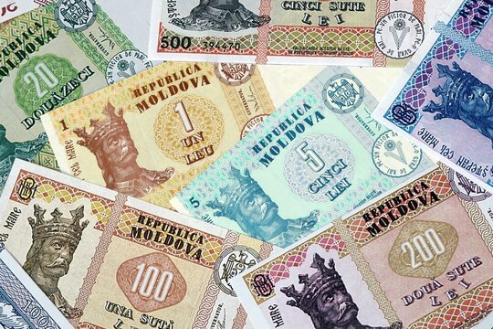 Moldovan leu money bills in pile. Big amount of Moldova MDL currency cash close up