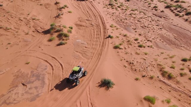 Aerial Drone View of UTVs Speeding Along Open Desert Trails in Utah
