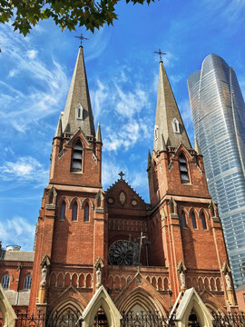 Xujiahui Catholic Church and modern skyscraper in Shanghai