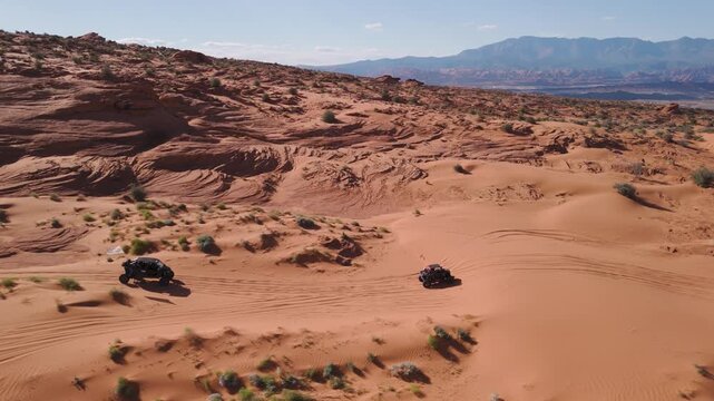 Aerial Drone View of UTVs Speeding Along Open Desert Trails in Utah