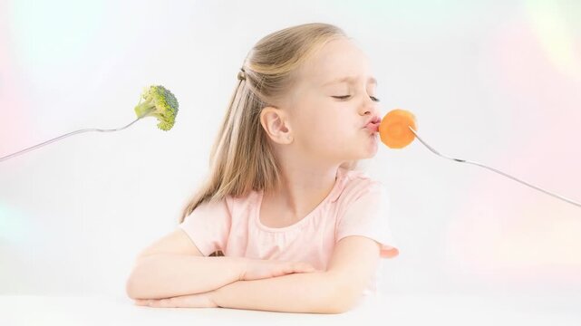 Happy young girl making a funny face while choosing between broccoli and a fork for healthy eating