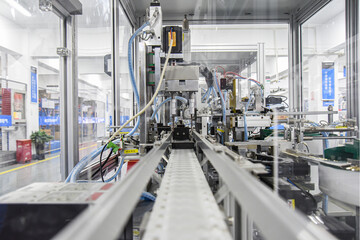 Fototapeta premium Automated Production Line Machinery in Modern Factory