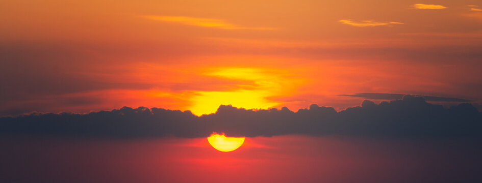 Sun, clouds and sky at summer sunset