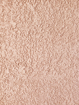 Pastel Stucco Wall Texture in Coral Background