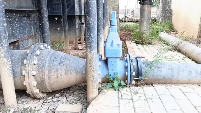 Vintage Ductile Iron DI Water Pipe System Featuring Sluice Valve Reducer And Bends In A Water Treatment Plant