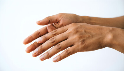 Fototapeta premium Close Up of Human Hands Applying Moisturizer or Hand Care Routine on White Background