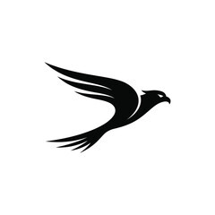 Fototapeta premium Minimalist black silhouette of a soaring falcon in flight.