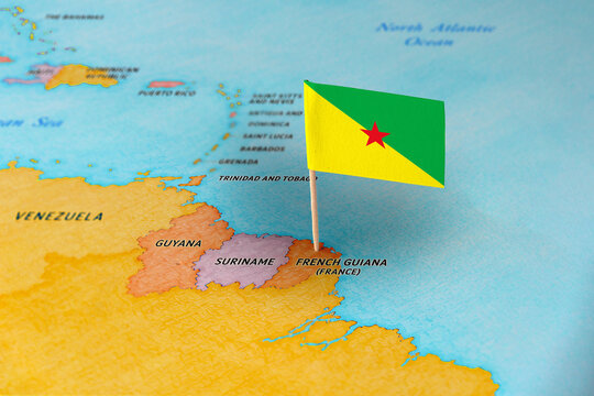 French Guiana flag pin marking French Guiana on South America map, travel concept