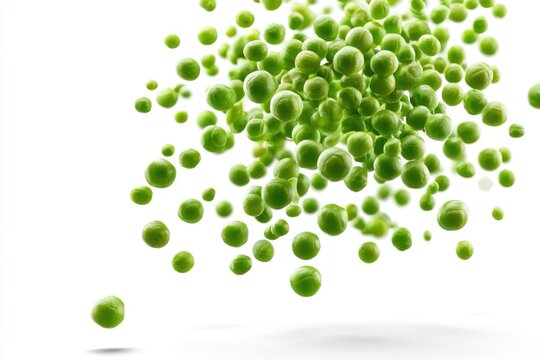 Fresh green peas suspended in mid-air against a white background, creating a dynamic, vibrant visual effect.