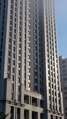 Obraz premium Tall Skyscraper Building in City, Modern Architecture