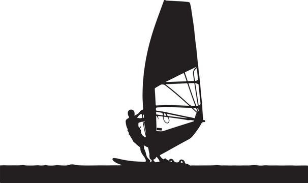 silhouette of a windsurfer
