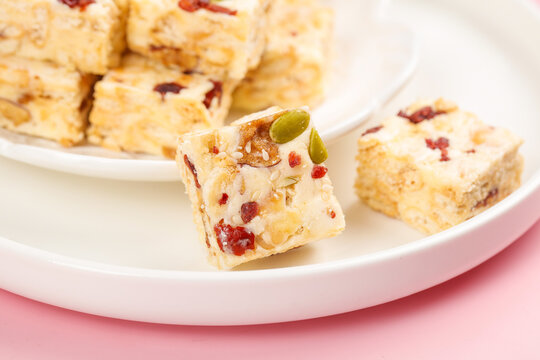 Handmade Praline Cranberry Shortbread Bars with Pistachio Garnish